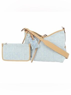 NWOT Louis Vuitton Carryall PM Monogram Denim bag in sky blue.